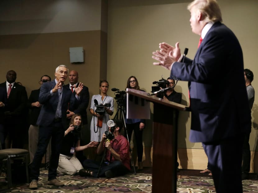 Miami-based Univision anchor Jorge Ramos, left, asks Republican presidential candidate Donald Trump a question about his immigration proposal during a news conference, on Aug 25, 2015, in Dubuque, Iowa. Ramos was later taken from the room. Photo: AP
