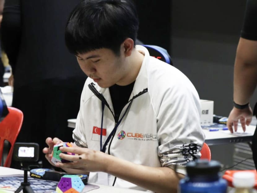 S'pore student crowned world champion at 12sided Rubik's puzzle after