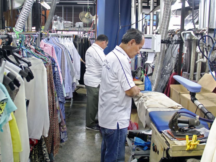 Presto Drycleaners workers in the production plant. TODAY file photo Presto Drycleaners workers in the production plant. TODAY file photo