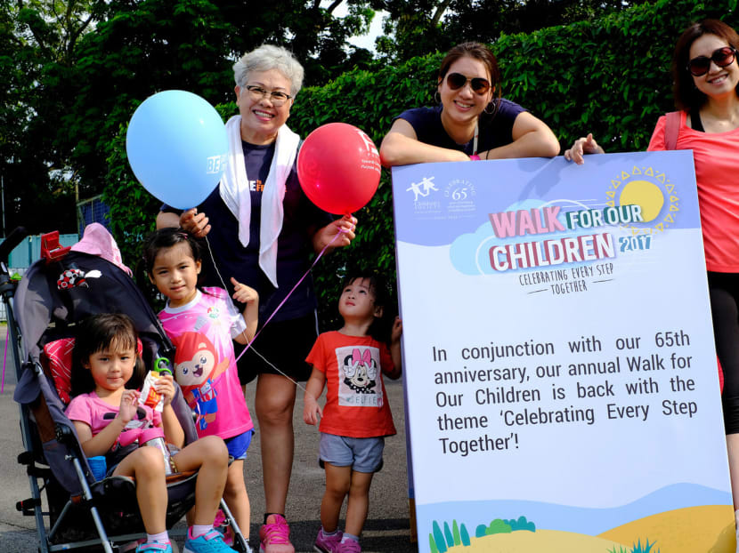 About 3,000 people took part in the Singapore Children’s Society walkathon yesterday. Funds were raised via the sale of carnival coupons and commemorative packs. Photo: Singapore Children’s Society