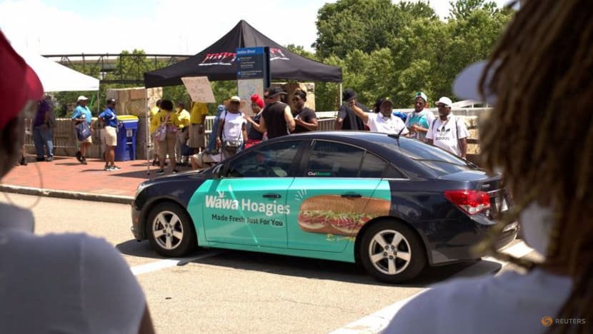 Gas at $5 leads some US rideshare drivers to wrap cars in ads Gas at $5 leads some US rideshare drivers to wrap cars in ads