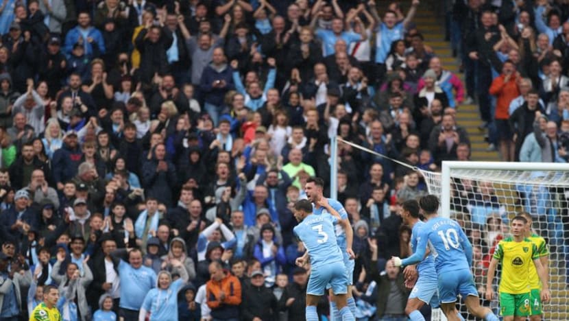 Soccer-Grealish on target as Man City put five past hapless Norwich