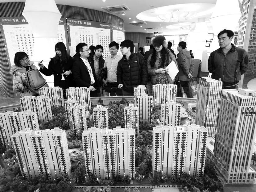 The average Beijing resident would have to save all of his income for 34 years before being able to purchase an apartment. Photo: Bloomberg