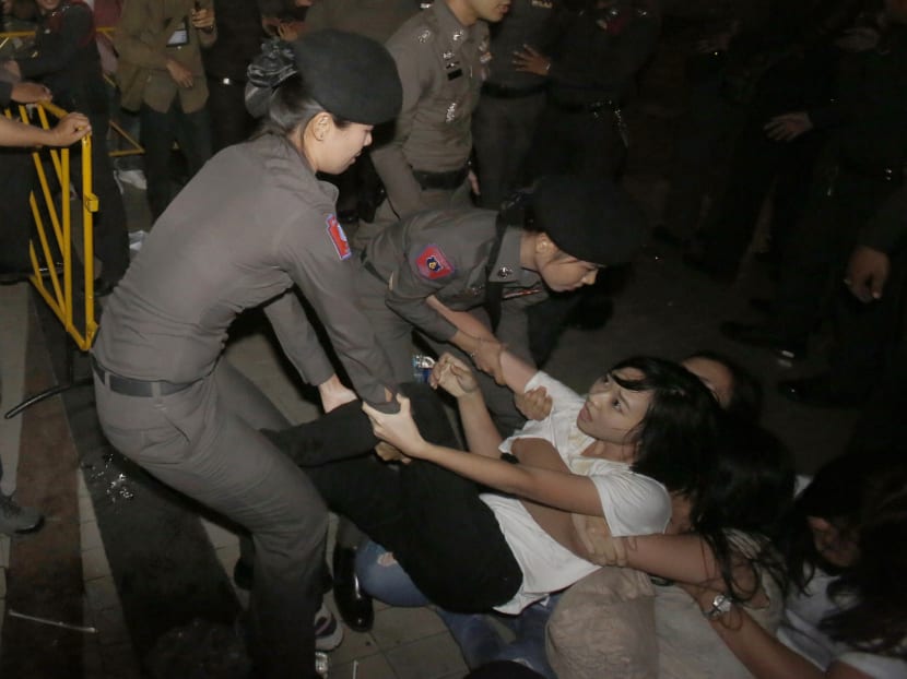 Gallery: Thai year-old coup imposes superficial calm but little else