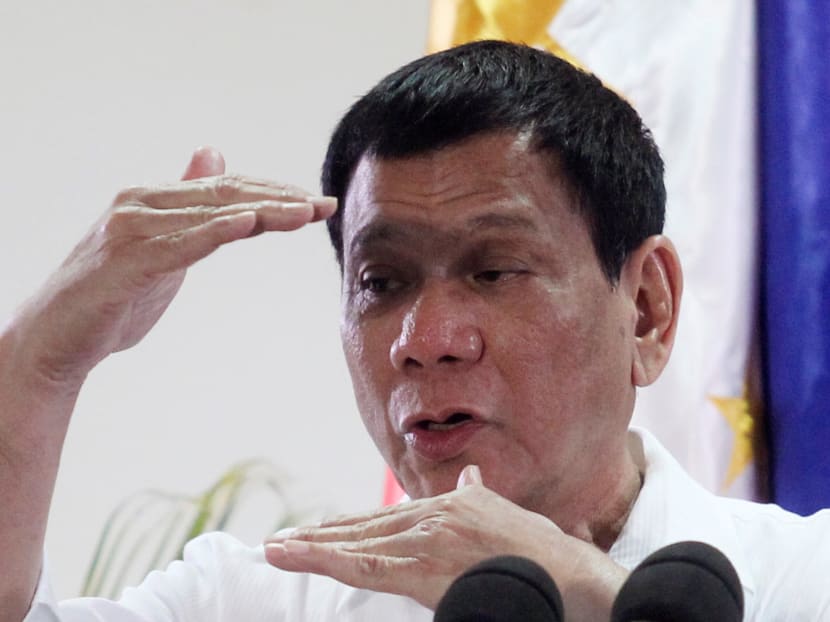 Philippine President Rodrigo Duterte gestures while answering questions during a news conference upon his arrival from a state visit in Japan at the Davao International Airport in Davao city, Philippines on Oct 27, 2016. Photo: Reuters