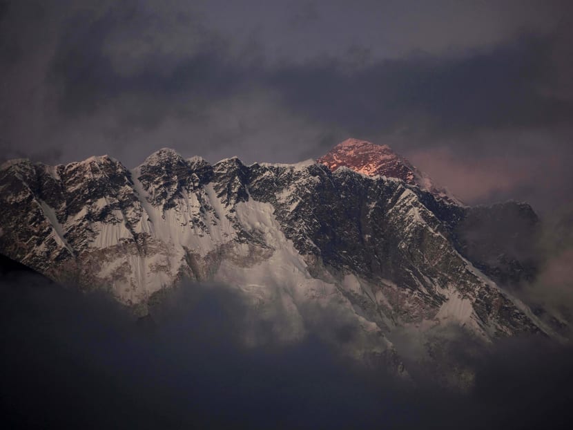 In this 2011 file photo, the last light of the day sets on Mount Everest as it rises behind Mount Nuptse as seen from Tengboche, in the Himalaya's Khumbu region, Nepal. Human waste left by climbers on Mount Everest has become a problem that is causing pollution and threatening to spread disease on the world’s highest peak, chief of Nepal’s mountaineering association said Tuesday, March 3, 2015. Photo: AP