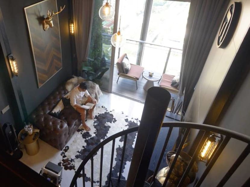 An 808 sq ft bachelor pad that comes with a cosy gentleman's loft bar An 808 sq ft bachelor pad that comes with a cosy gentleman's loft bar