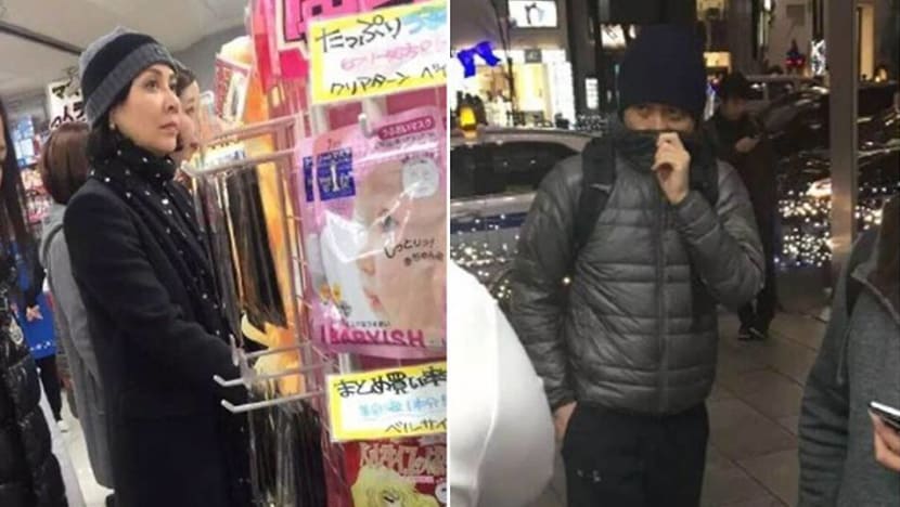 Tony Leung waits in the cold while Carina Lau shops in Japanese drugstore