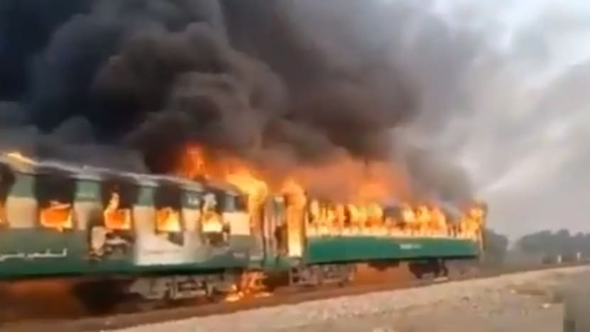 At least 71 killed, dozens injured after train fire in Pakistan caused by cooking accident At least 71 killed, dozens injured after train fire in Pakistan caused by cooking accident