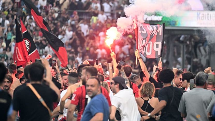 AC Milan win first Serie A title in 11 years after final-day victory at Sassuolo
