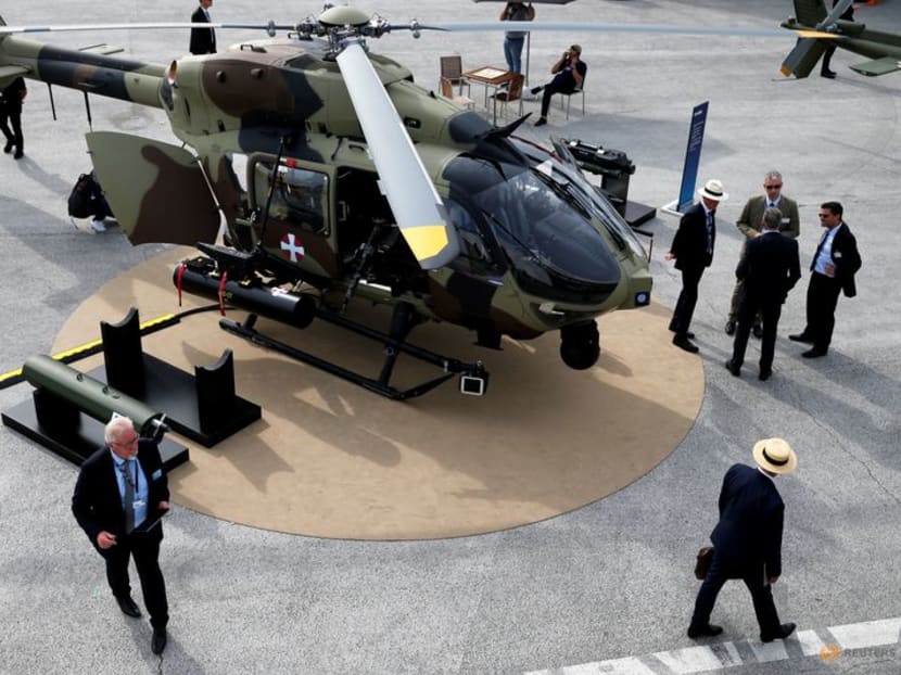 FILE PHOTO: Visitors look at an Airbus Helicopter H145 on static display during the 53rd International Paris Air Show at Le Bourget Airport near Paris, France, June 18, 2019. REUTERS/Pascal Rossignol/File Photo FILE PHOTO: Visitors look at an Airbus Helicopter H145 on static display during the 53rd International Paris Air Show at Le Bourget Airport near Paris, France, June 18, 2019. REUTERS/Pascal Rossignol/File Photo