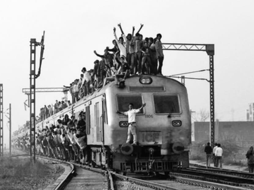 Passengers travelling on an overcrowded train on the outskirts of New Delhi earlier this year. For India, one of the world’s most populous countries, and a primary source of global population growth, fertility rates are now down to 2.48 children per woman, and the UN projects they will reach replacement level by 2025-30. Photo: Reuters