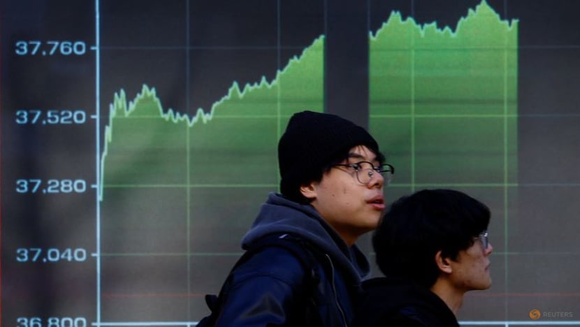Stocks fall, dollar and yields gain after hot US inflation data - CNA