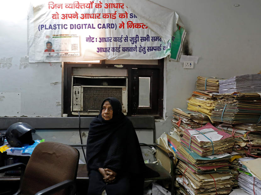 A woman waits for her turn to to enrol for the Unique Identification (UID) database system, also known as Aadhaar, at a registration centre in New Delhi. Lawyers for about 30 different plaintiffs have recently been arguing in the Supreme Court that Aadhaar violates a fundamental right to privacy. Photo: Reuters