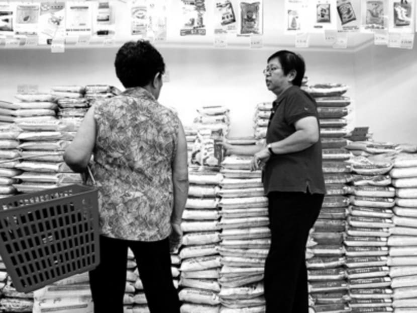 Interaction between supermarket staff and senior consumers can help forge community ties. TODAY file photo