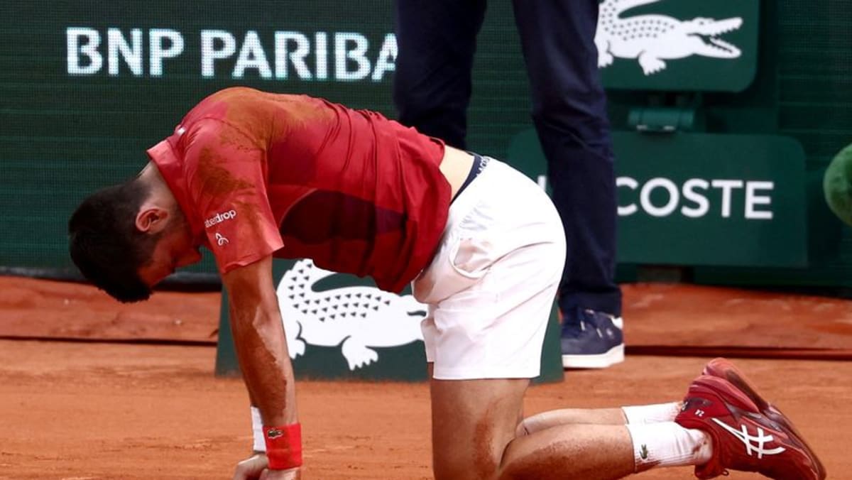 Djokovic unsure about French Open quarter-finals after knee injury - CNA
