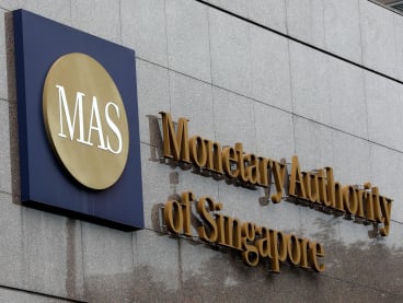 A signage outside the Monetary Authority of Singapore building along Shenton Way.