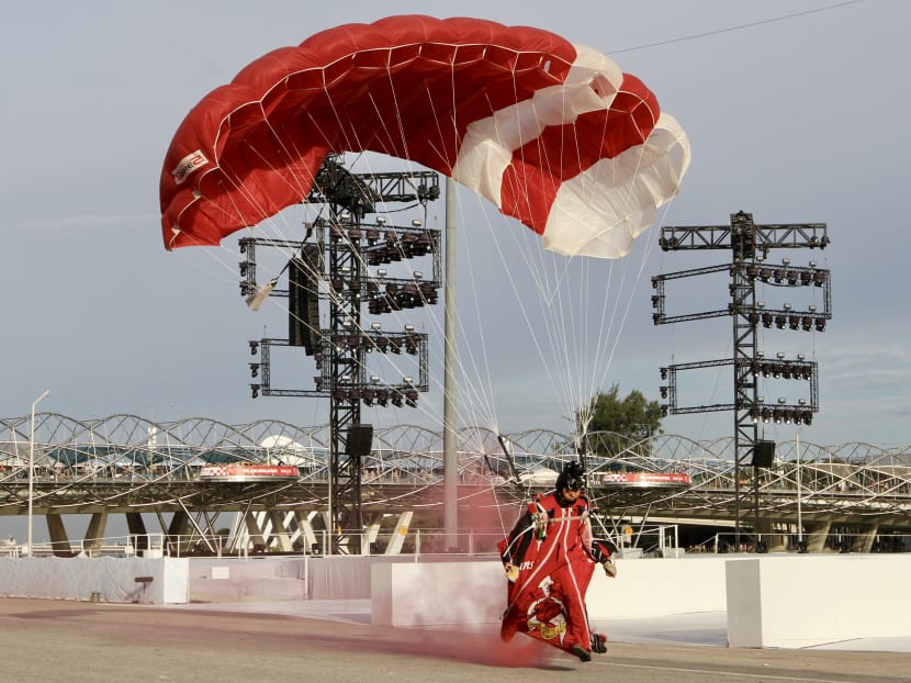 A Red Lion parachutist landing on The Float @ Marina Bay during the National Day Parade celebrations in 2018. Defence Minister Ng Eng Hen said that the next two NDPs will be held there before the site closes for a few years to be built into the new NS Square.