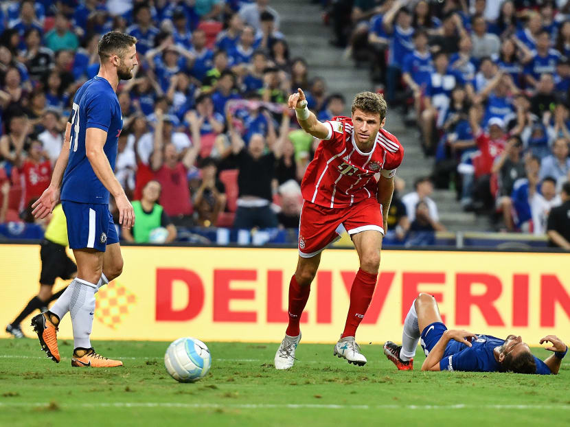FC Bayern Munich's Thomas Mueller (centre) celebrates his goal against Chelsea during the International Champions Cup match at the National Stadium in Singapore. Photo: 2017 International Champions Cup Singapore