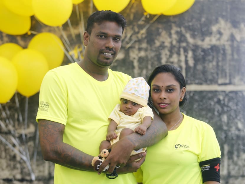 Mr Albert Silvaraj with his wife Shanthi Nila and their five-month-old son. He said the stigma of being an ex-offender used to haunt him, but he has found peace through his wife. Photo: Najeer Yusof