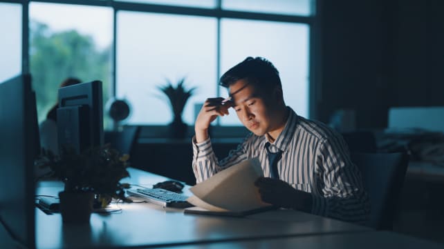 Commentary: Competing with robots is making work worse