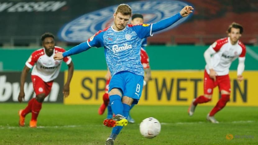 Football: Second-tier Kiel ease past Essen to reach German Cup semis Football: Second-tier Kiel ease past Essen to reach German Cup semis