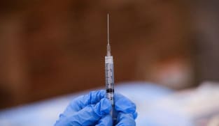 US judge blocks Biden federal employee COVID-19 vaccine mandate