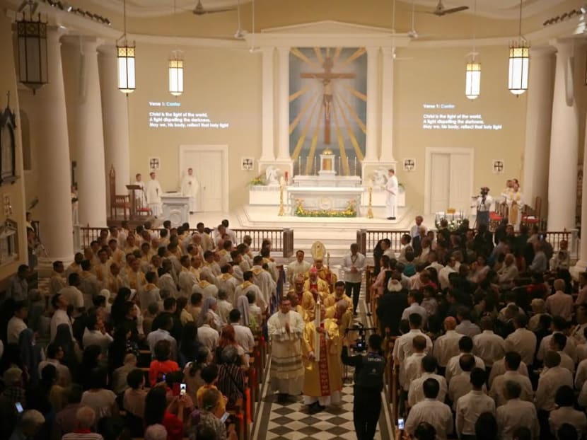 About 2,700 churchgoers and visitors from all walks of life gathered at Queen Street to witness the three-hour mass led by Archbishop William Goh. Photo: Nuria Ling/TODAY