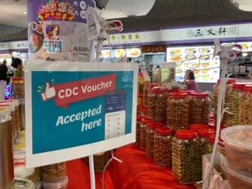 A CDC voucher sign at a hawker centre in Kampung Admiralty Community Plaza on Jan 3, 2023. 

