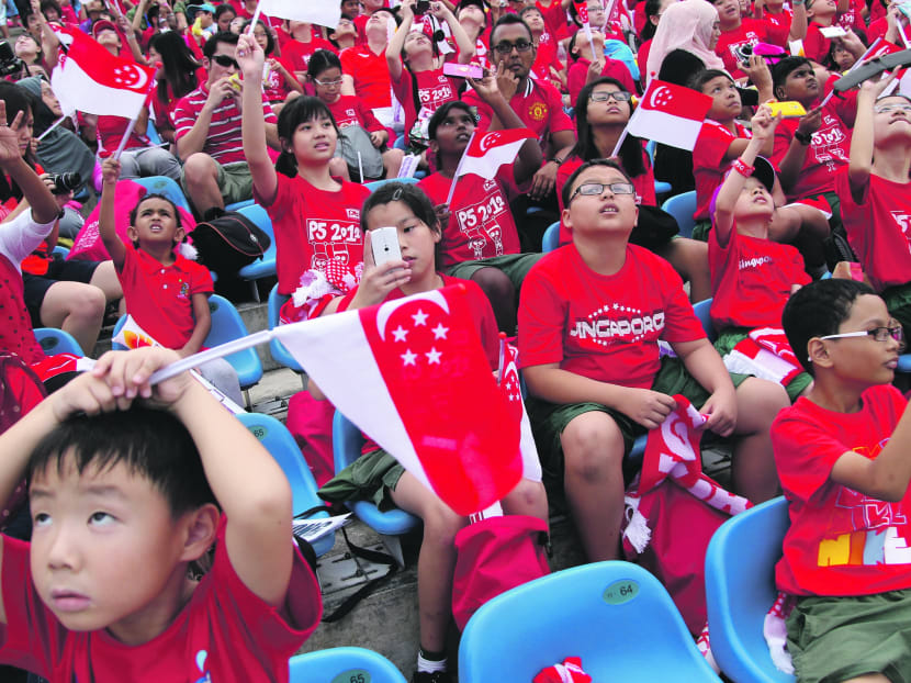 Songs such as  One People, One Nation, One Singapore can create the wrong impression that different ethnic groups have significant differences, not just in appearance, but in other aspects. TODAY file photo