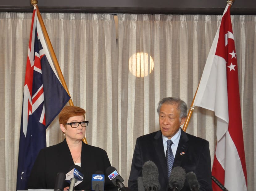 Minister for Defence Dr Ng Eng Hen and his Australian counterpart Marise Payne speaking to the media after the meeting with Townsville leaders. Photo: Ministry of Defence