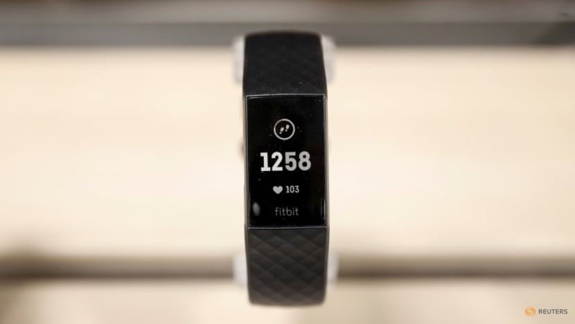 Google Fitbit Peloton announce fitness content partnership CNA