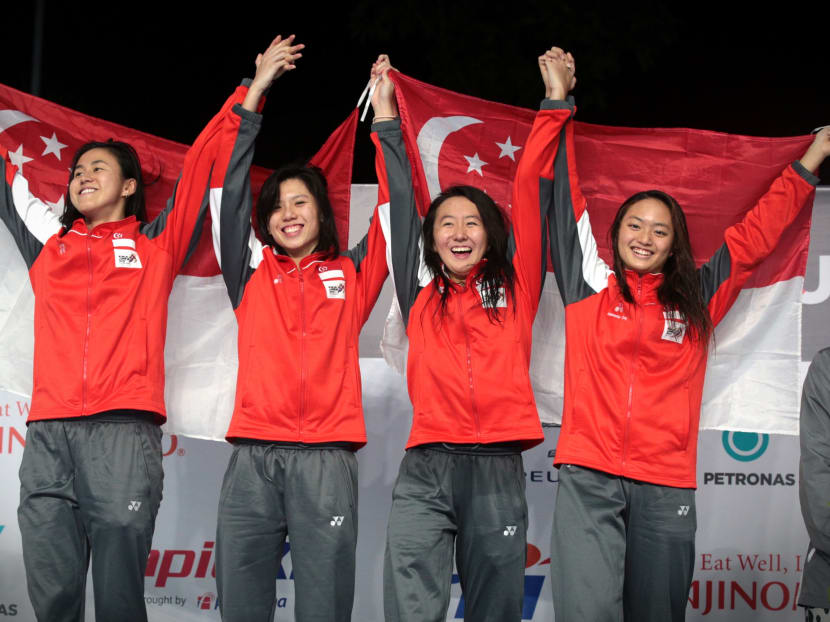 The Singapore women's 4x100 freestyle team celebrate after winning the SEA Games gold medal at National Aquatics Centre in Kuala Lumpur on August 21, 2017. Photo: Jason Quah/TODAY