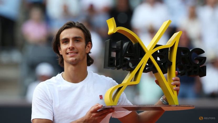 Italian Musetti defies odds to lift maiden title in Hamburg Italian Musetti defies odds to lift maiden title in Hamburg