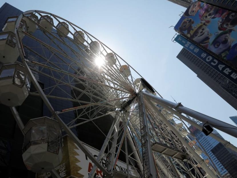 A Ferris wheel lifts spirits in New York's Times Square A Ferris wheel lifts spirits in New York's Times Square