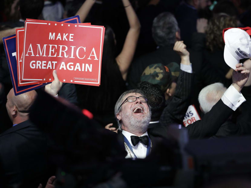 PHOTO OF THE DAY: Supporters of Donald Trump reacting to election results. Mr Trump would go on to win the race to the White House, beating expectations, and becoming the 45th President of the United States. Photo: AP