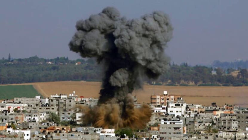 Hamas rockets target Tel Aviv after Israeli raid flattens Gaza tower Hamas rockets target Tel Aviv after Israeli raid flattens Gaza tower