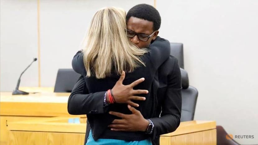 'I forgive you': Emotional scenes as ex-Dallas cop sentenced to 10 years' jail for murder