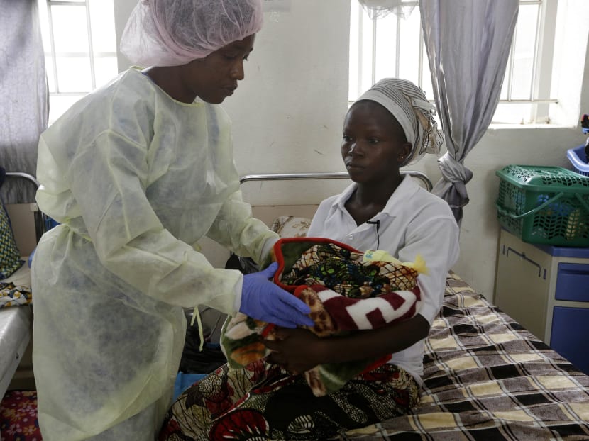 Gallery: Ebola survivor who lost 21 relatives gives birth to baby boy