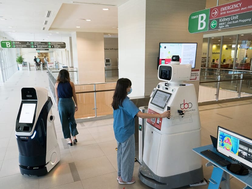A robot at hospitals under the National University Health System can prevent a visitor from entering if he refuses to comply with the rules.