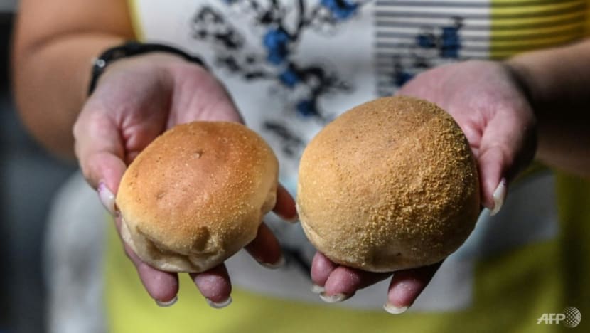 Philippine bakeries shrink 'poor man's bread' as inflation bites Philippine bakeries shrink 'poor man's bread' as inflation bites