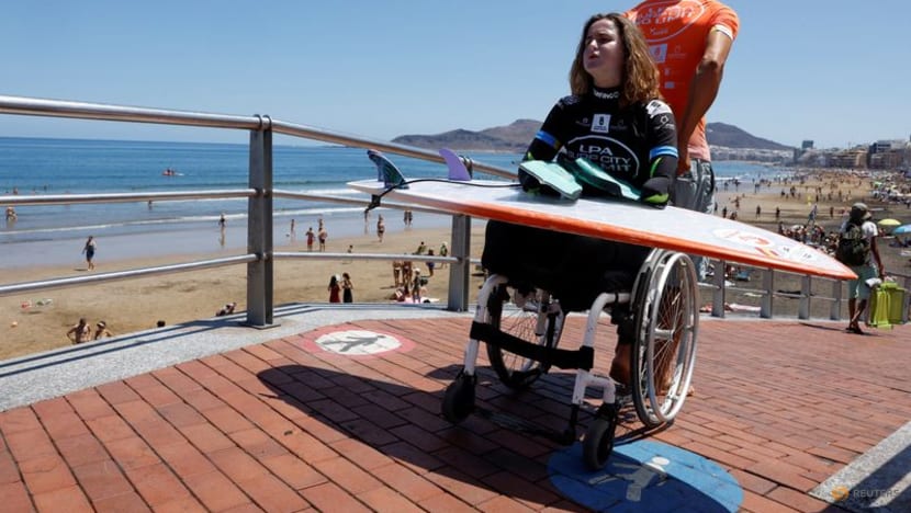 Surfing-Amputee surfer making waves in the sport