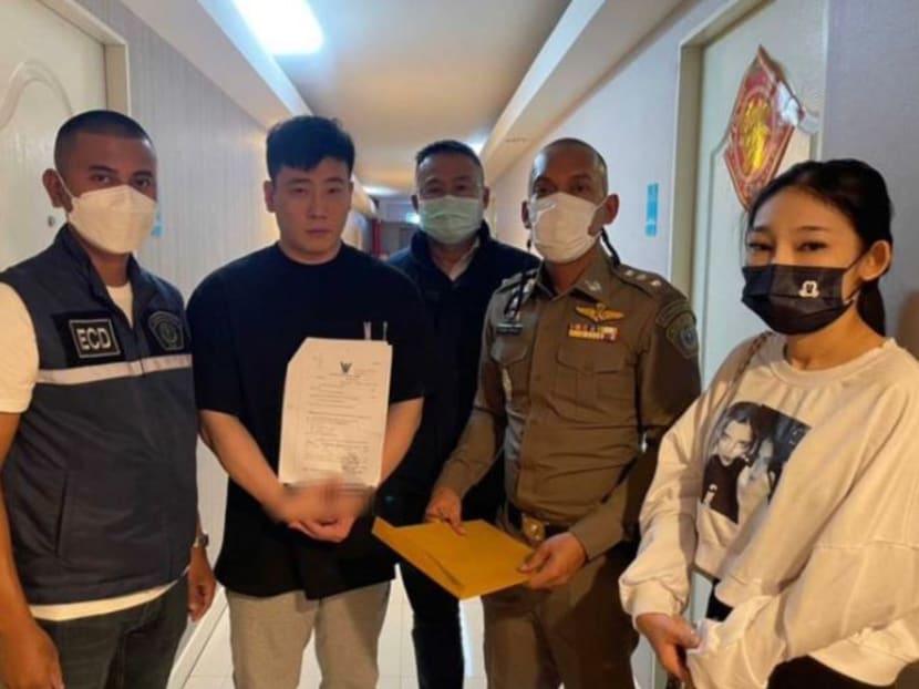 Ong Jian Zhen (second from left) was arrested in Thailand on Oct 26, 2022 for using a fake passport to enter the country. 