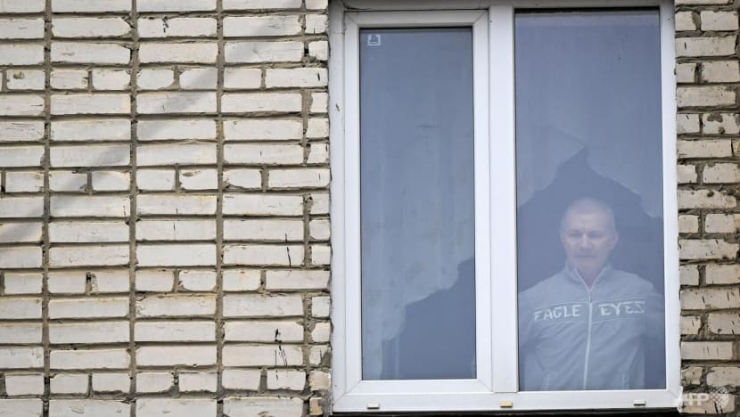 Russian whose daughter drew anti-war picture gets two years' jail but flees Russian whose daughter drew anti-war picture gets two years' jail but flees