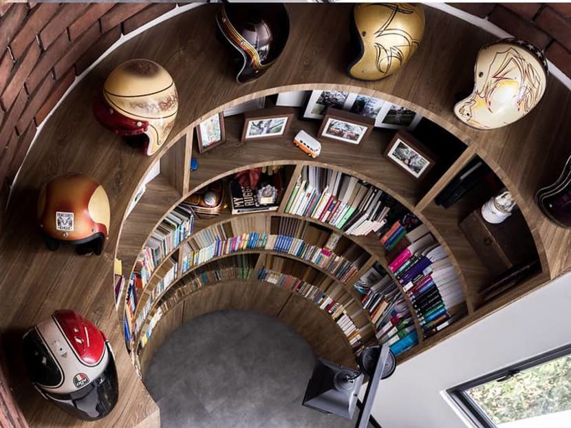 This family’s cafe-inspired HDB maisonette has a huge home library for their books This family’s cafe-inspired HDB maisonette has a huge home library for their books
