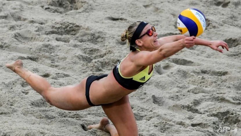 Beach volleyball players cleared to wear bikinis in Qatar event Beach volleyball players cleared to wear bikinis in Qatar event