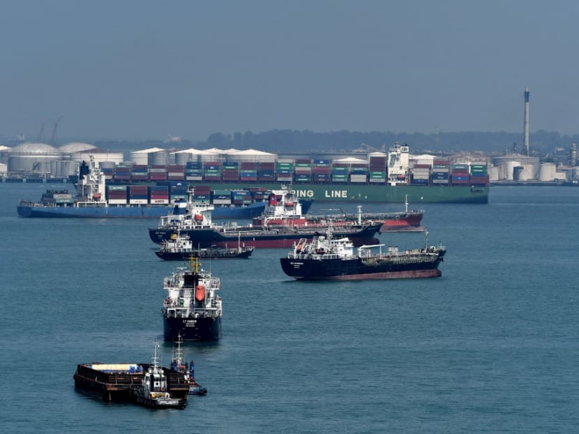 This photograph taken on June 6, 2018 shows vessels anchored along the southern strait of Singapore.