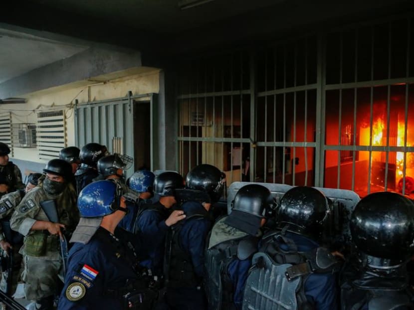 Paraguay's biggest prison set ablaze, rioting inmates take guards hostage Paraguay's biggest prison set ablaze, rioting inmates take guards hostage