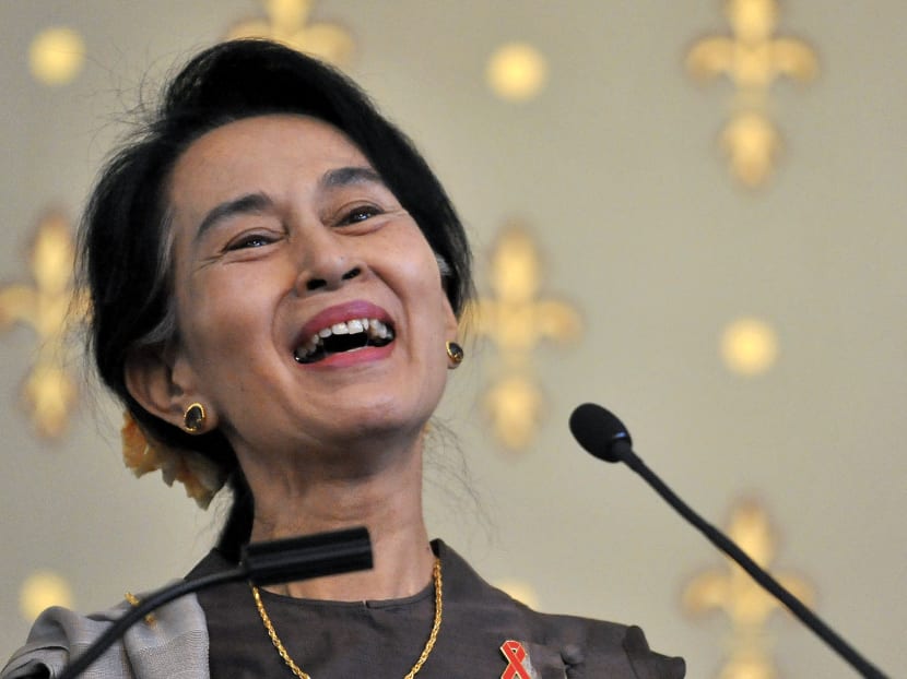 Aung San Suu Kyi smiling during her speech. Photo: AP