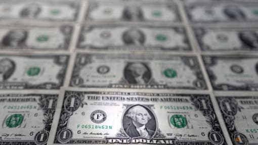 Bruised dollar hits new 1-month low; Lagarde boosts euro